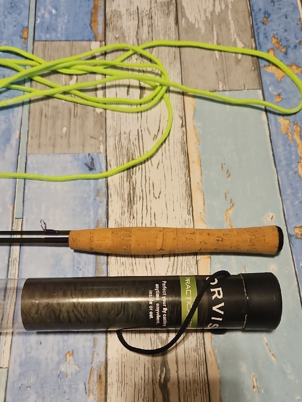 Orvis PractiCaster compact 47" indoor/outdoor practice fly rod. Base cork grip.